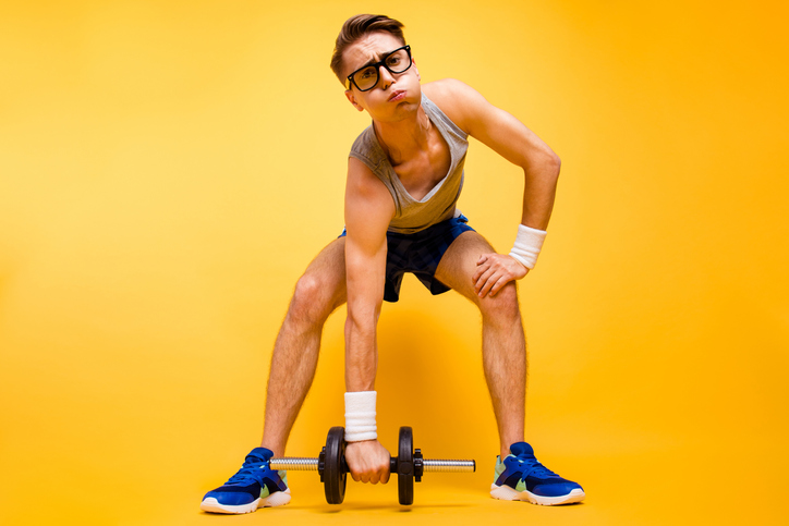 Weight Loss: The Ultimate Guide: Nerd lifting dumbell
